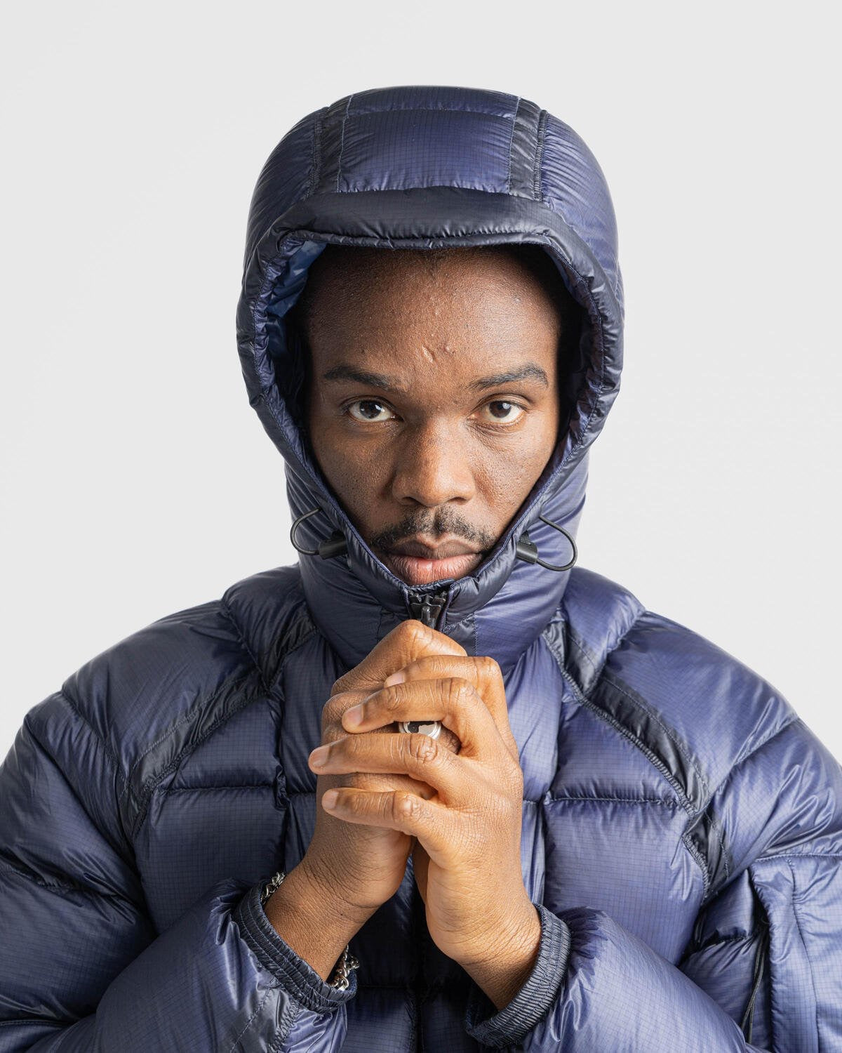 Warme CP Pufferjacke Estate Blue: Stylische, wasserabweisende Winterjacke für Herren