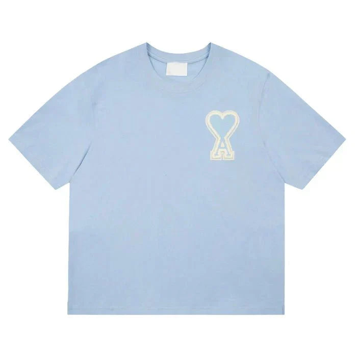 https://cdn.shopify.com/s/files/1/0901/0413/6028/files/ami-heart-tee-951907.webp?v=1743324147