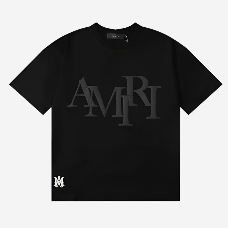 https://cdn.shopify.com/s/files/1/0901/0413/6028/files/amiri-staggered-logo-black-t-shirt-762741.jpg?v=1743904144