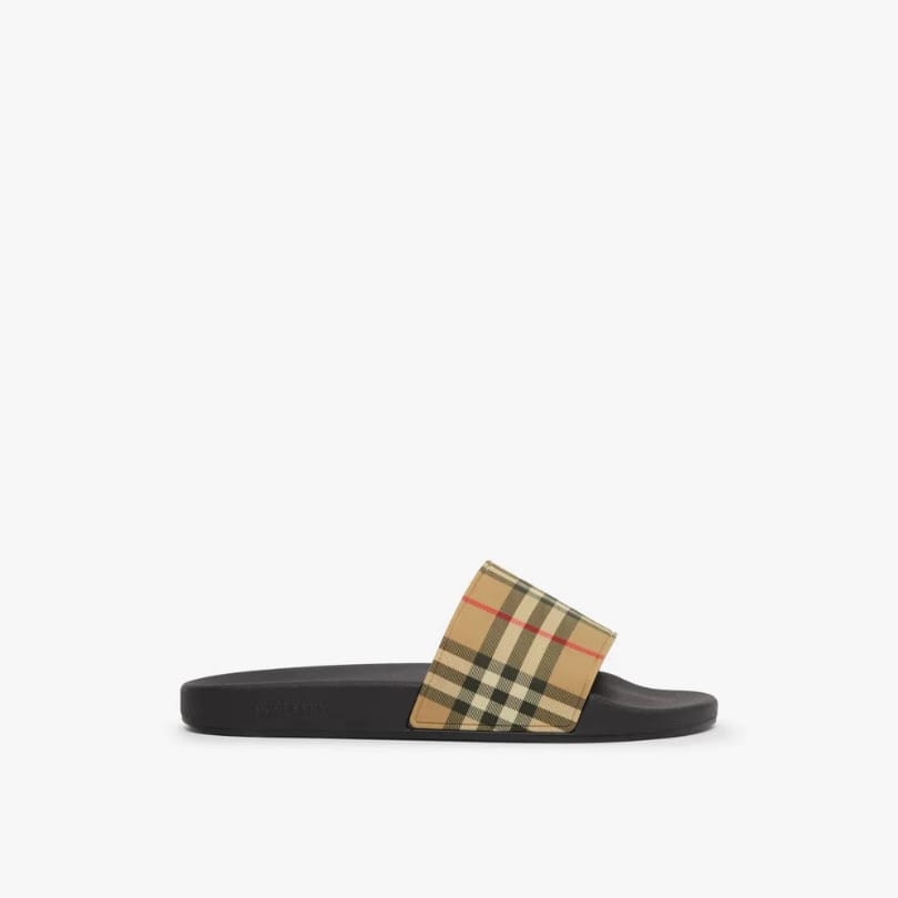 https://cdn.shopify.com/s/files/1/0901/0413/6028/files/slide-sandals-burberry-140316.jpg?v=1743988875